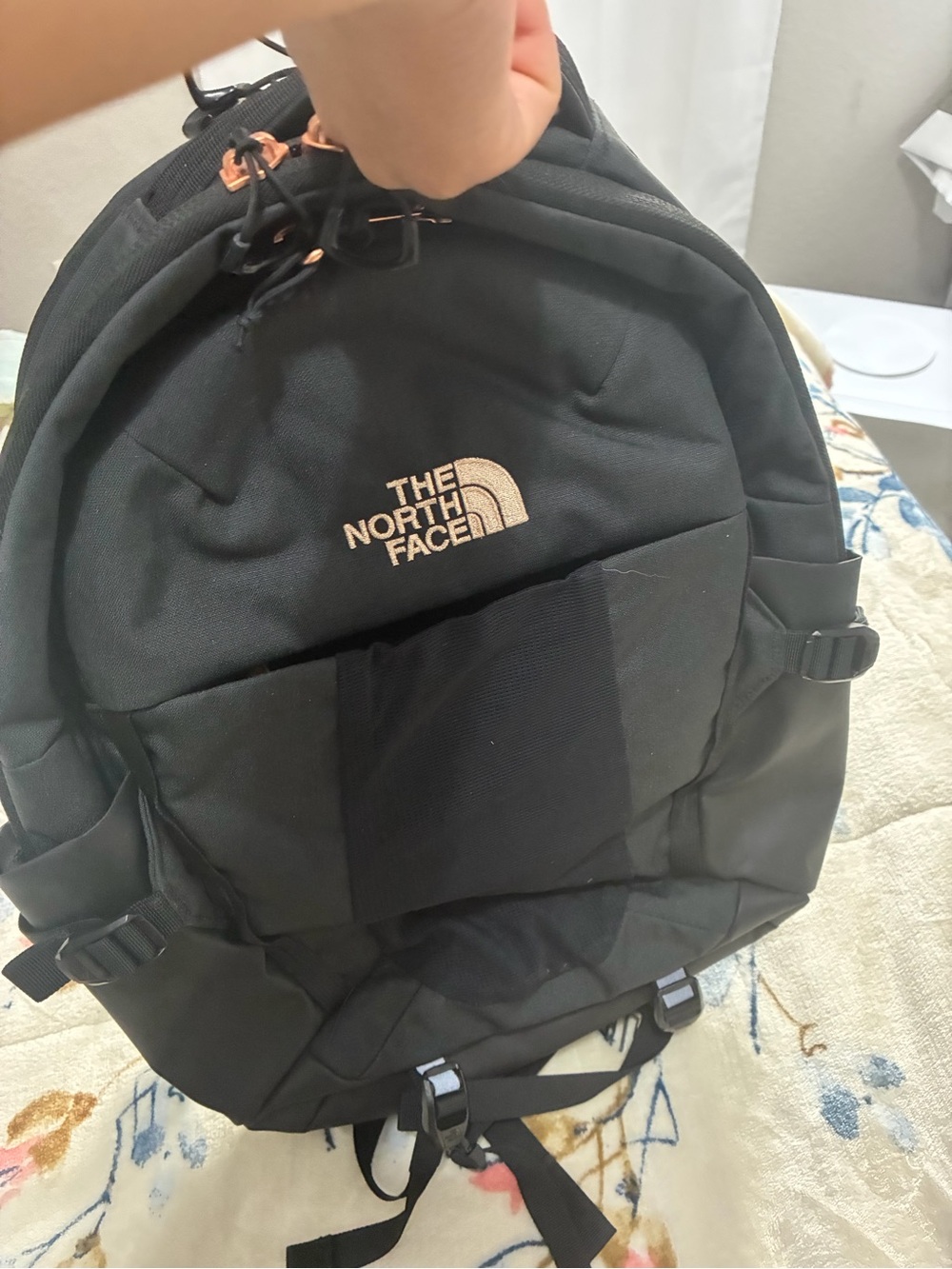 The North Face Black Backpack with Rose Gold Accents